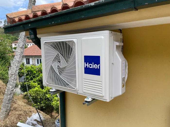 Ar condicionado Haier exterior parede Vila Meã
